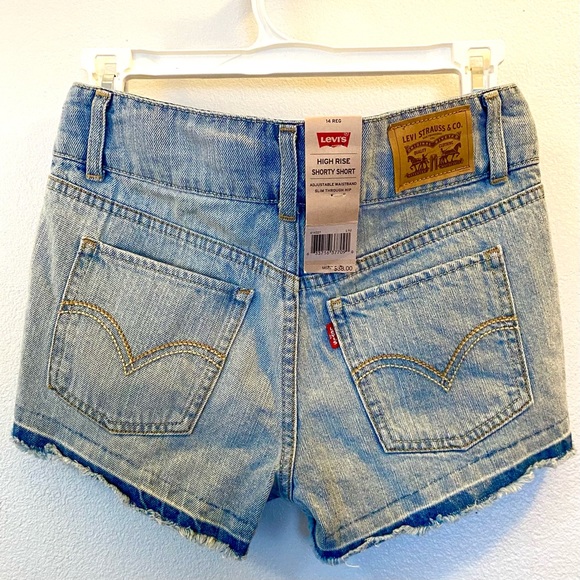 Levi’s High Rise Frayed Shorts in Faded Denim - Picture 2 of 10